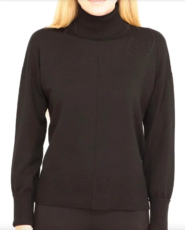 Color - Blocked Women Sweater for a Bold Fashion StatementLong Sleeved Turtleneck With Side Slits In Black