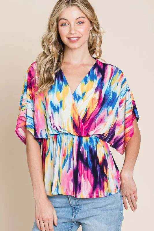 Printed Surplice Peplum Blouse