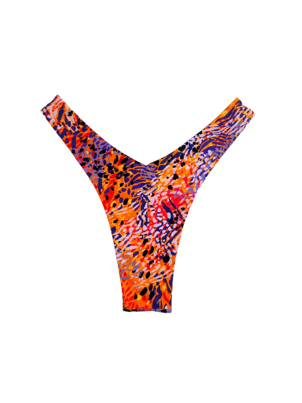 Printed floral women swimwear for a feminine and colorful beach vibeZIGGY Y CUT BOTTOM